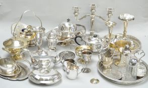 A collection of assorted silver plate, to include cake baskets, candelabra and others,