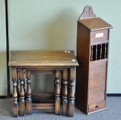 An nest of three oak rectangular tables and a stained oak stick stand with drawer,
