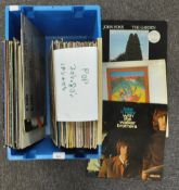 A group of assorted vinyl LP's to include 70's & 80's pop and 12"
