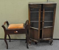 An oak bookcase, 106cm x 61cm x 24cm,