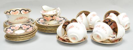A 19th century porcelain tea service decorated in iron red,