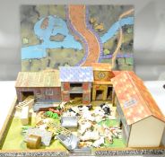 A vintage Britains style farm yard scene with animals