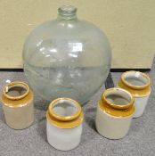 A Carboy and a group of glazed jars