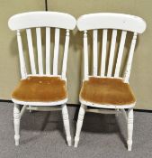 A pair of painted chairs,