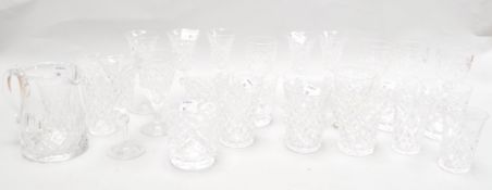A collection of cut glass tumblers,