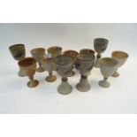 A group of Art pottery goblets,