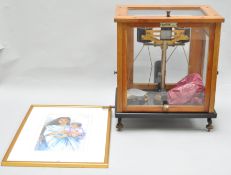 A set of laboratory scales, 37cm x 43cm,