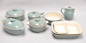 A group of Denby Stoneware casserole dishes, oven dishes, a sauce dish and jug,