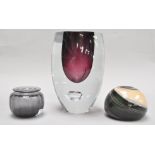 A collection of three Studio art glass items, to include a paperweight,