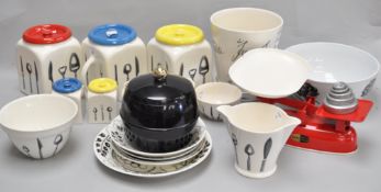A collection of kitchenware pots, bowls, jugs and plates by Pountney & Co Ltd, Bristol long line,