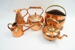 A collection of copper, to include a watering can and coal scuttle,