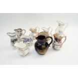 A collection of 19th century and later jugs, to include Gaudy Welsh, Beech & Hancock and others,
