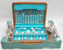 A collection of silver plate and stainless flatware along with a canteen of cutlery