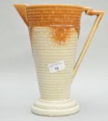 A Wedgwood & Co Ltd pottery Art Deco style ewer with ribbed decoration,