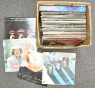 A group of vinyl LPs to include 70's & 80's pop