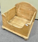 A pine dog bed, of square box form, the back domed and on plain sides with a scooped front,