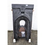 A cast iron fire back (ex-Coxley railway cottage)