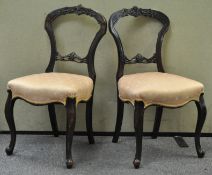 Two balloon back chairs, in mahogany on cabriole legs,