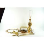 A brass lamp and other items