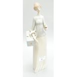 A Lladro figure of a lady, 34cm high,