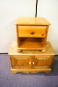 A pine cupboard and a bedside table