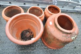 A rhubarb forcer and a quantity of terracotta garden pots