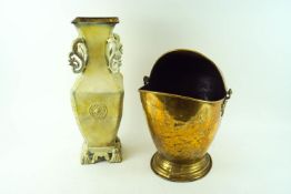 A metal vase and a coal bucket