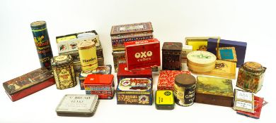 A group of assorted tins and boxes