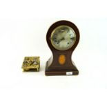 An Edwardian mahogany inlaid mantel clock with Roman numeral dial,