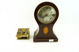 An Edwardian mahogany inlaid mantel clock with Roman numeral dial,