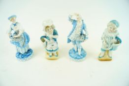 A pair of 19th century Continental porcelain figures together with another pair