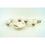 A Fenton China Company set of six cups, saucers and cake plates,