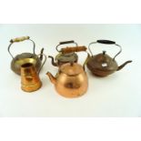 A collection of copperware kettles and a jug