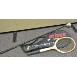 A vintage Dunlop tennis racquet, together with a Wilson tennis racquet and a Macgregor golf club