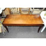 A mahogany rectangular coffee table