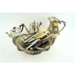 A silver plated cake basket, teapot,