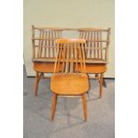 A set of three Ercol wall shelves and three stick back chairs