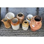 Three stone glazed jars and other items