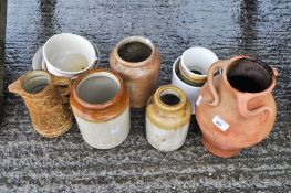 Three stone glazed jars and other items