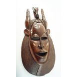 A late 20th century African tribal mask,