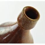 A 19th century salt glazed stoneware bottle,