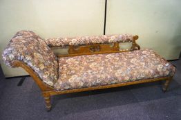 An oak chaise longue