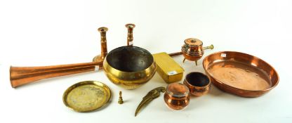 A copper postal horn and other copper and brassware