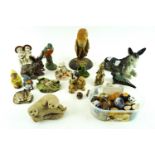 A collection of assorted figures depicting birds, donkeys,