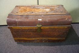 An early 20th century tin dome top trunk with scumbled finish
