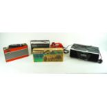 A collection of portable radio's and music systems