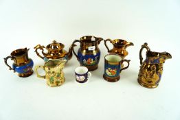 A group of lustre ware jugs and others