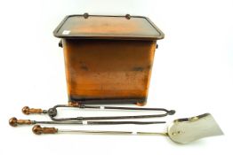 An Art Deco style copper plated coal scuttle and a set of three fire irons