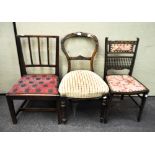 A mixed set of chairs, to include a George III rail back chair with pad seat,