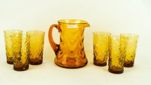 A 1960s retro vintage amber gold glass lemonade set to include a Whitefriars jug and six beakers